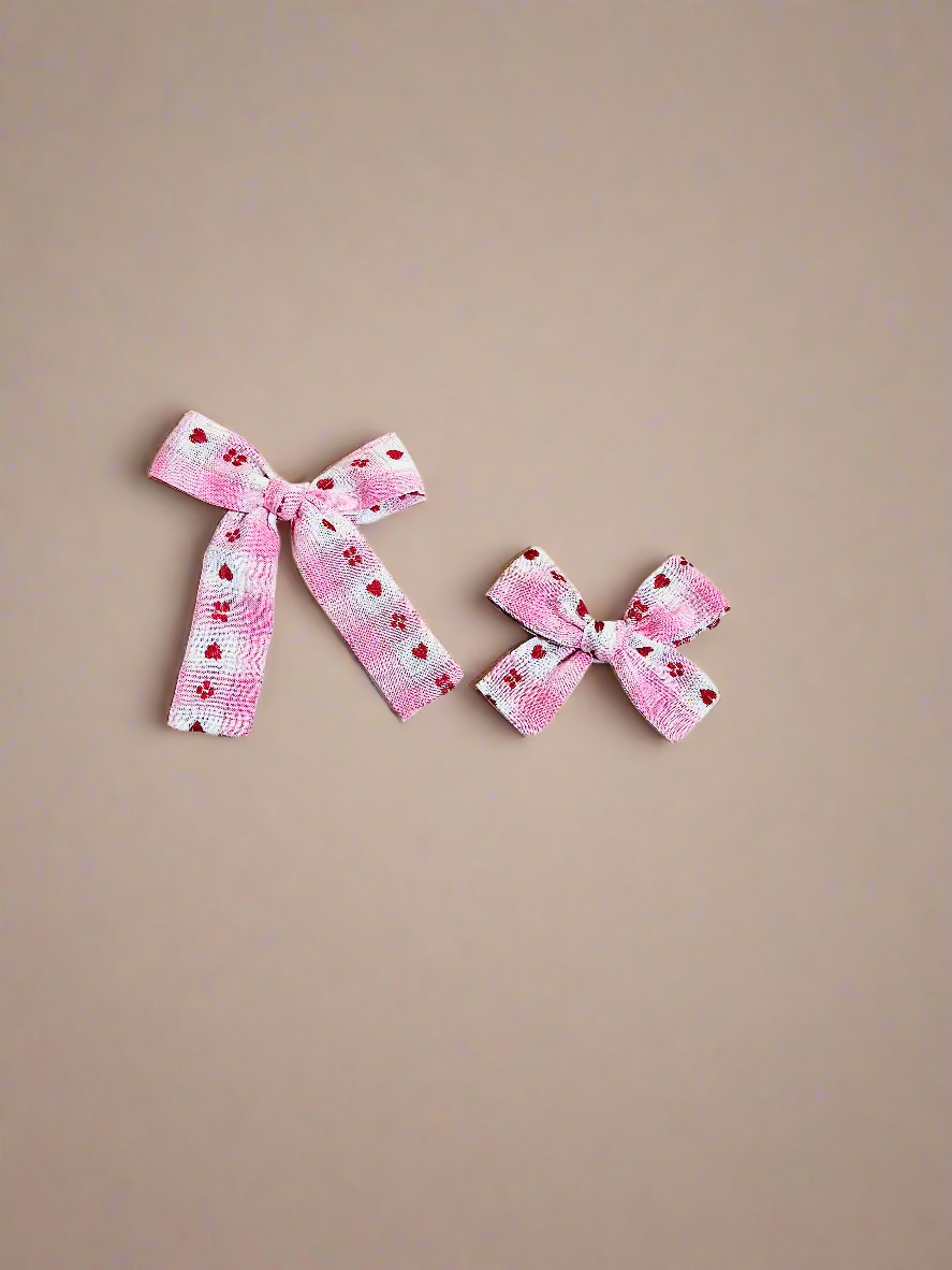 Heart pinwheel hair bow
