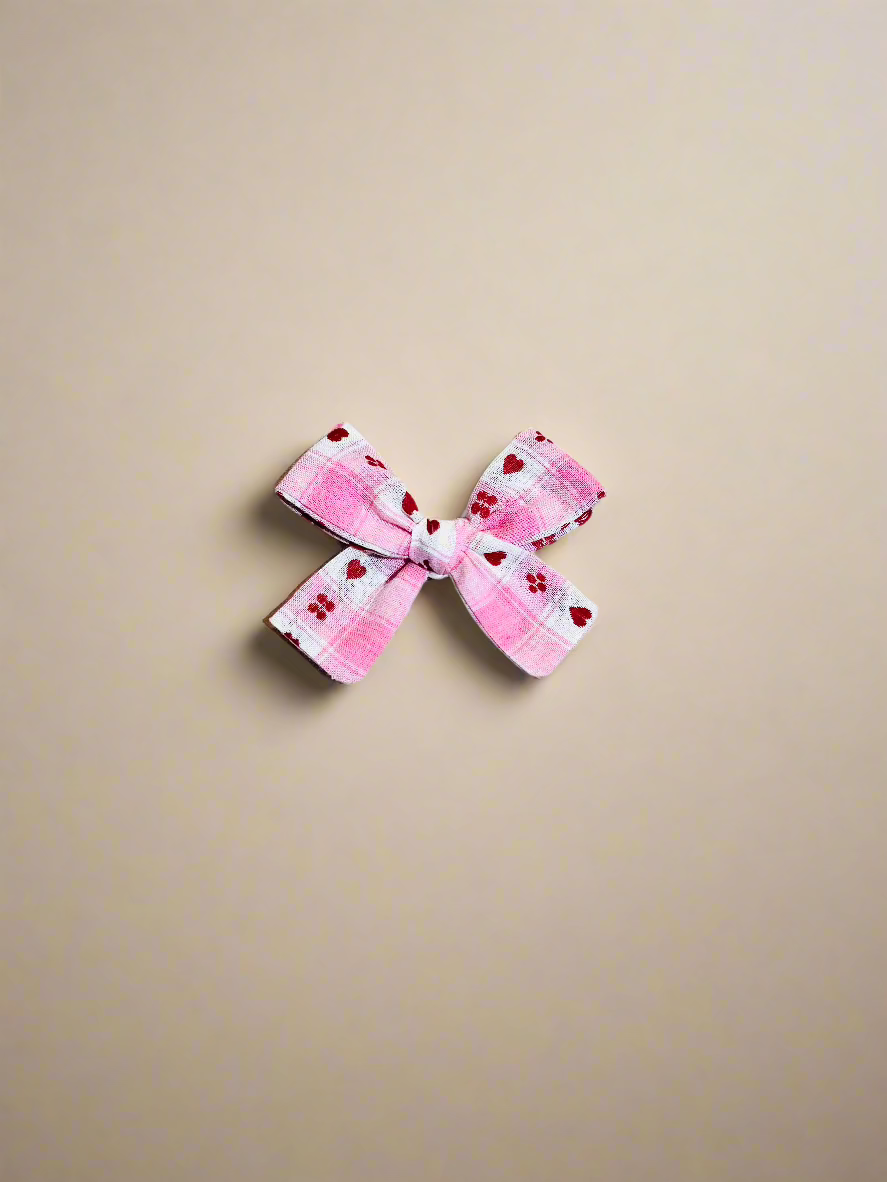 School girl hair bow with hearts