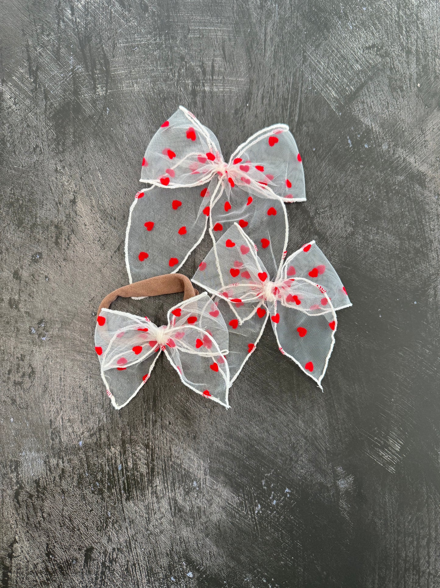 red heart fable bow
