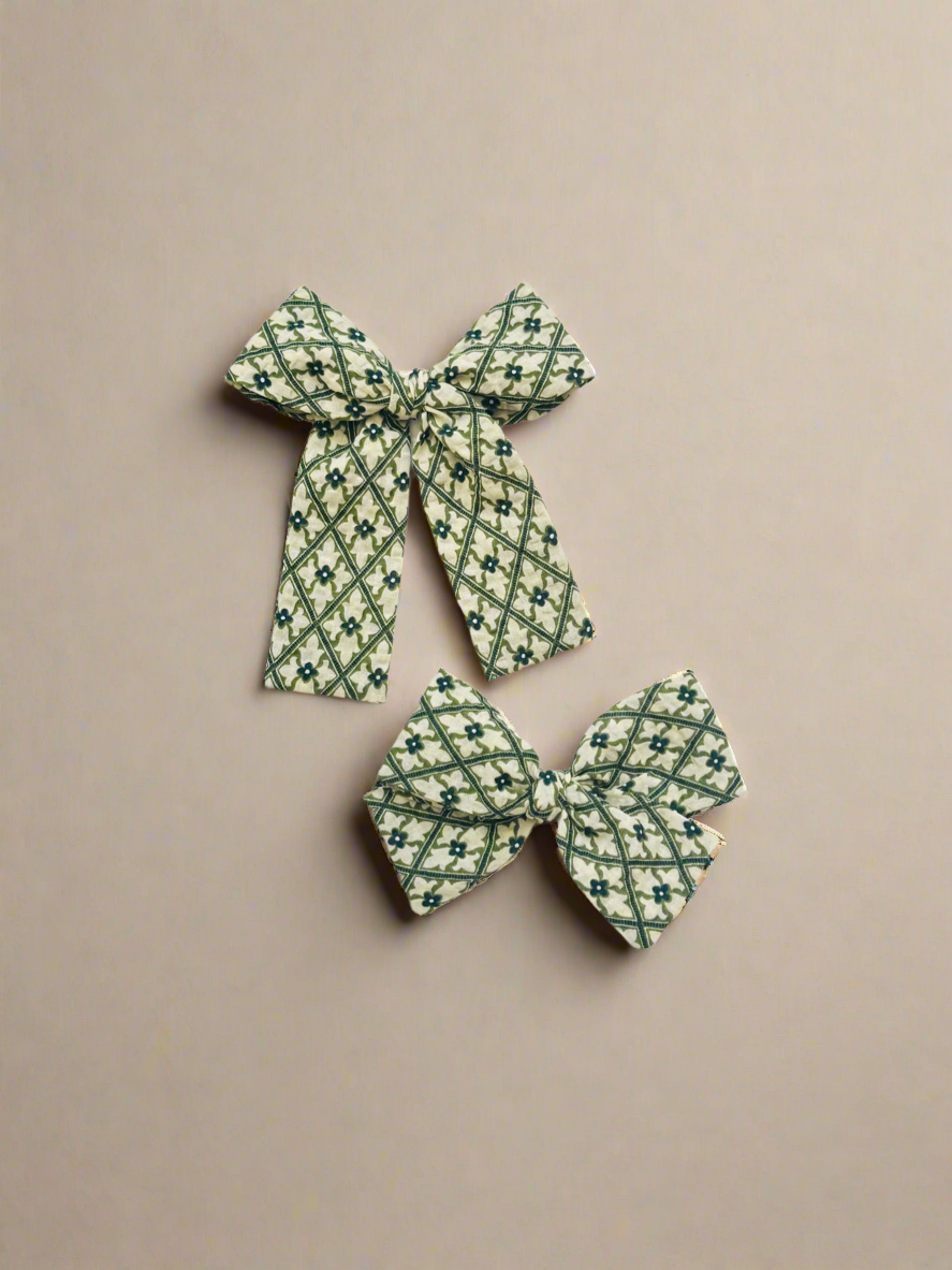Ivy Lane Bow – handmade hair bow with vintage-inspired floral diamond pattern