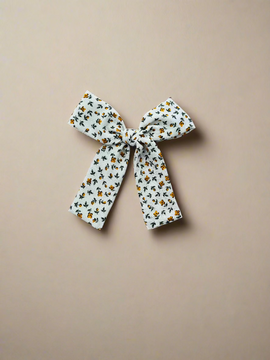 Yellow flower hair bow long tail