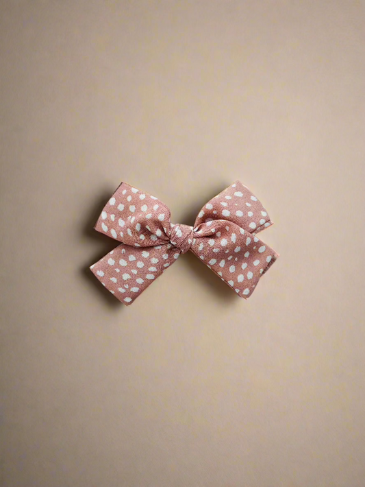 Pink dotted bow 