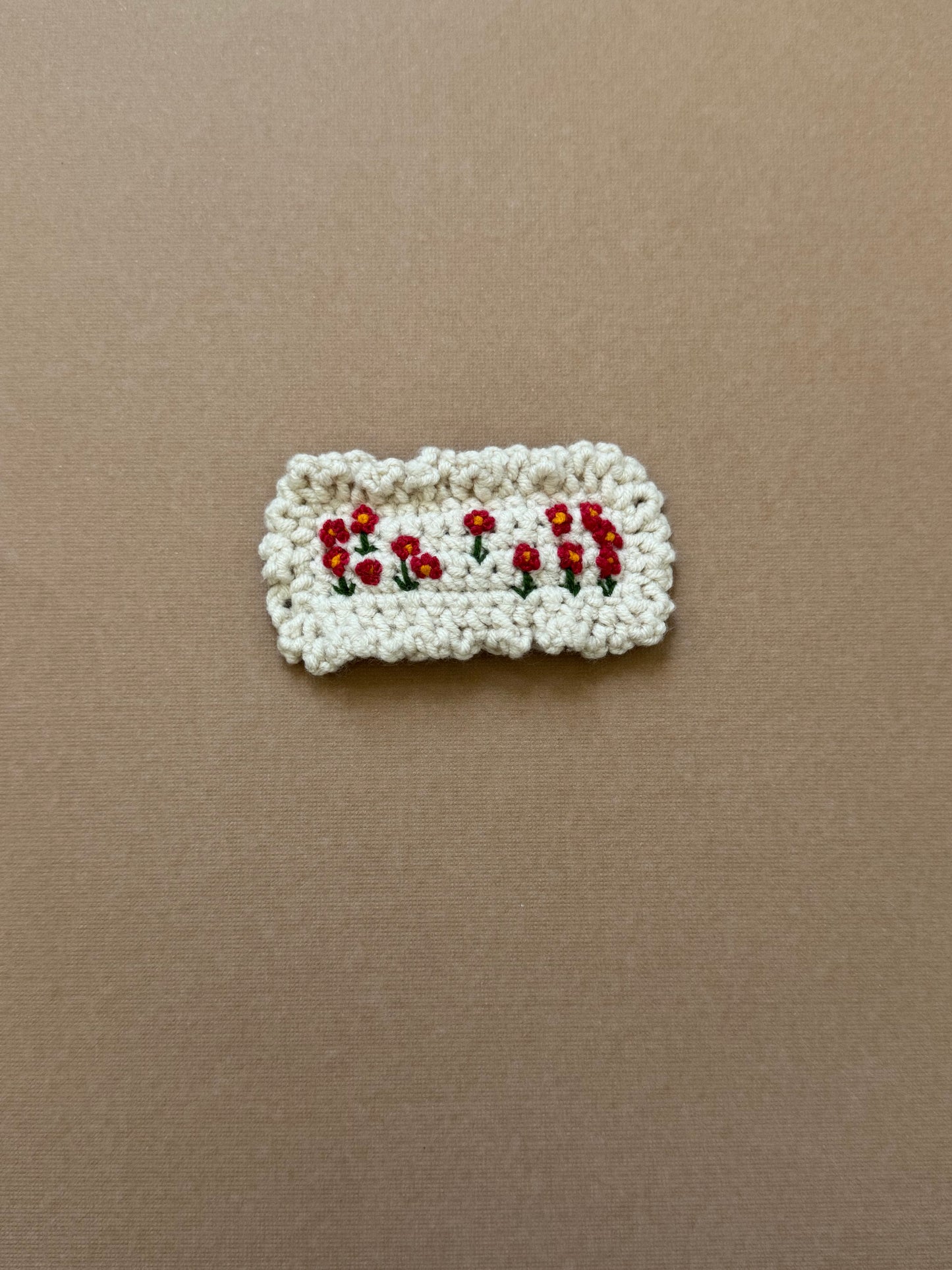 Crochet snap clip with red flowers 