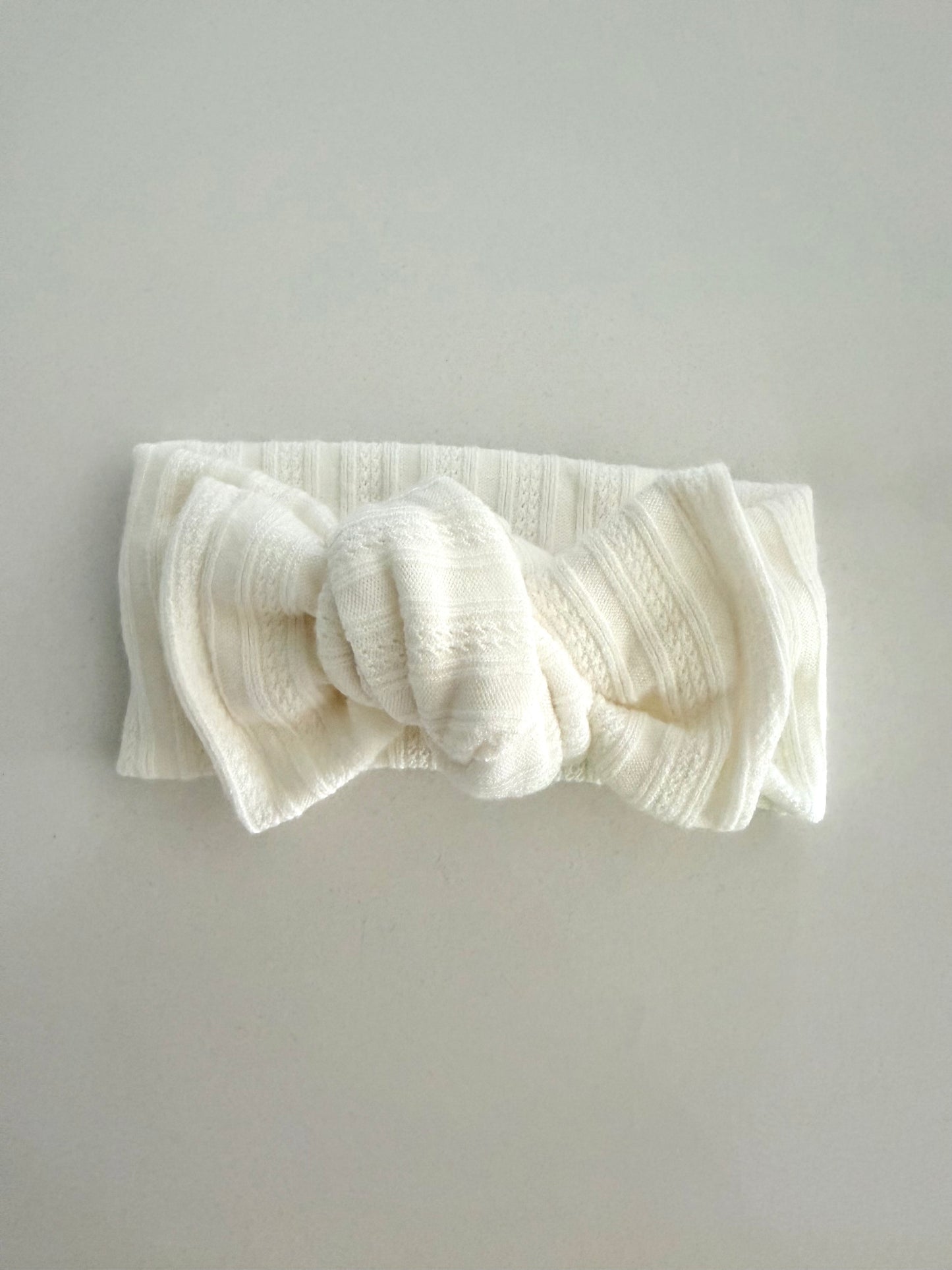 Ivory cotton pointelle baby head wrap by Juju and Vivi – pre-tied bow for newborns and toddlers