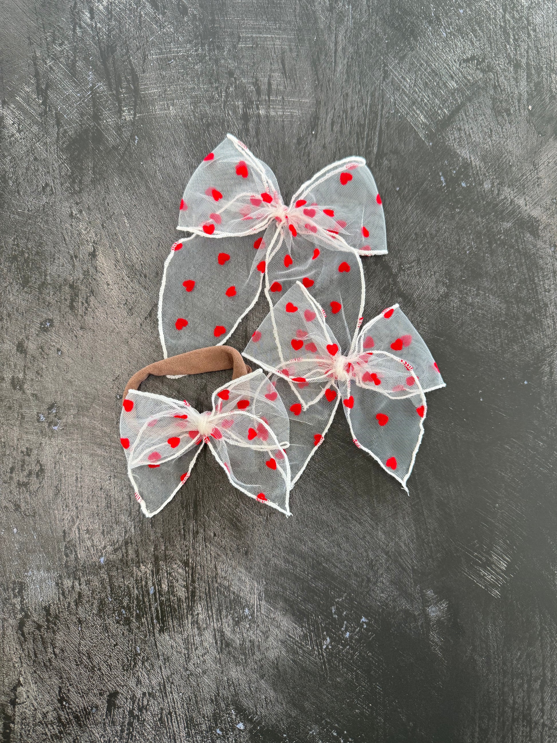 red heart fable bow